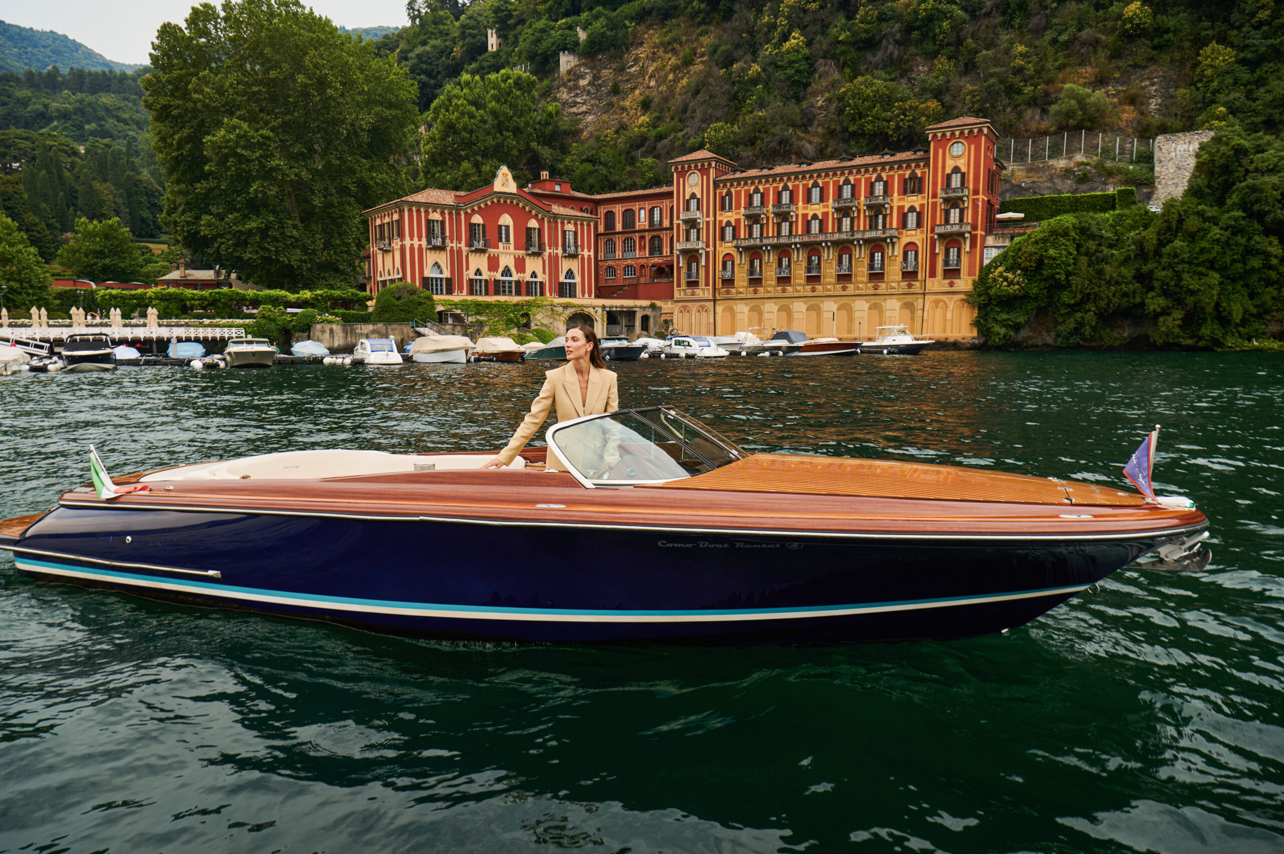 classic wooden boat on lake como